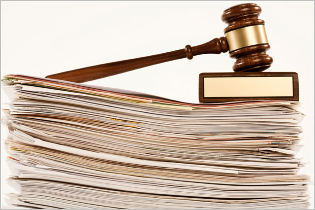 gavel on stack of documents
